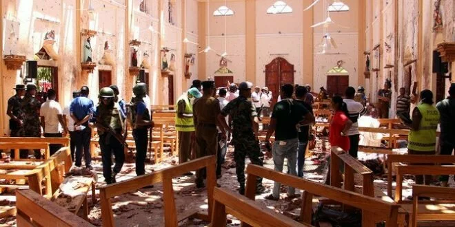 Sri Lanka in lockdown after hundreds killed in bomb attacks